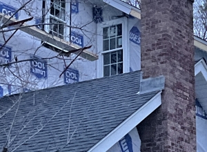 44 square roof with new lead on chimney 